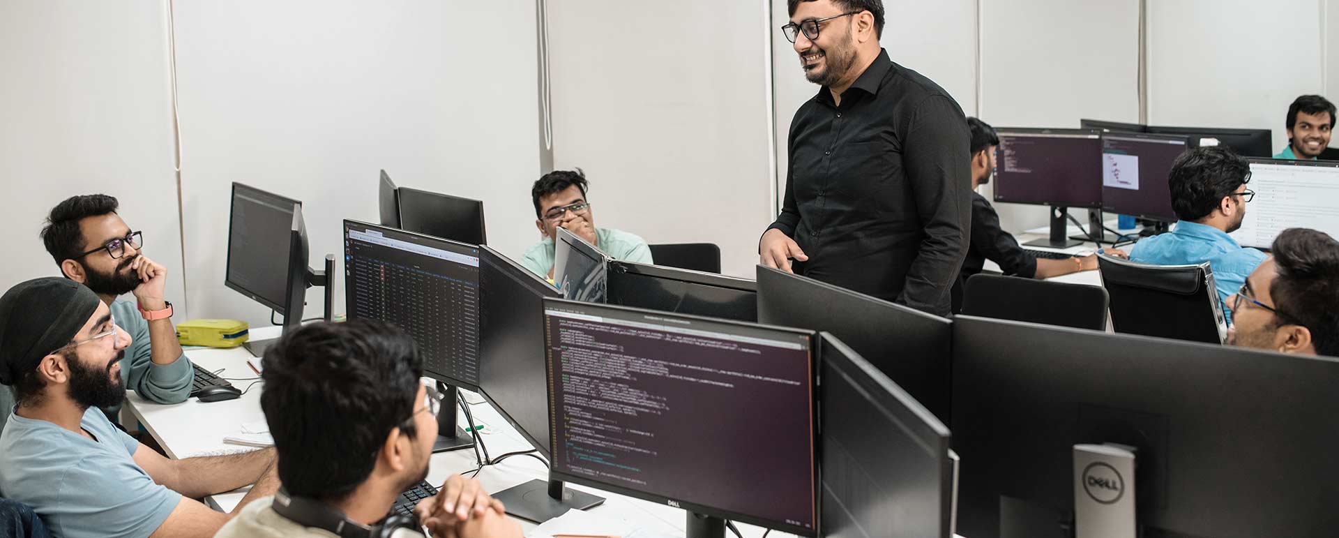 Mathisys Quantcap team members collaborating at work